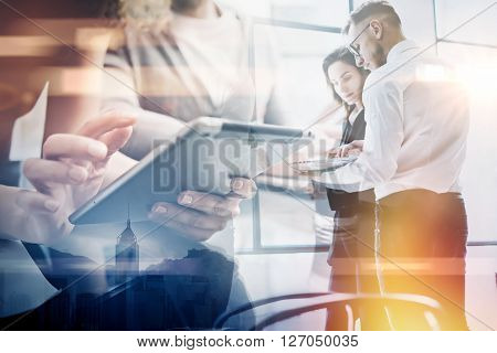 Business team work process.Double exposure photo professional crew working with new startup project.Investment managers meeting. Analyze business plans laptop.Blurred, film and bokeh effect.