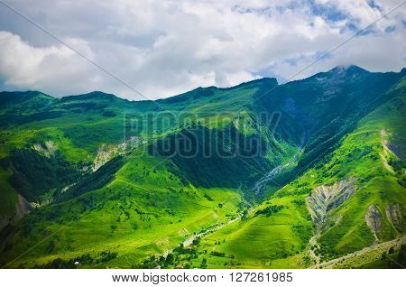 Green caucasus  mountain landscape in Georgia, natural travel vacation background