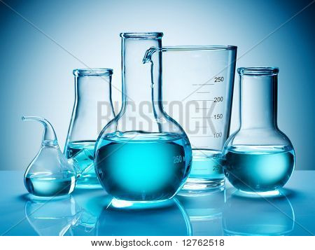 Assorted laboratory glassware equipment ready for an experiment in a science research lab