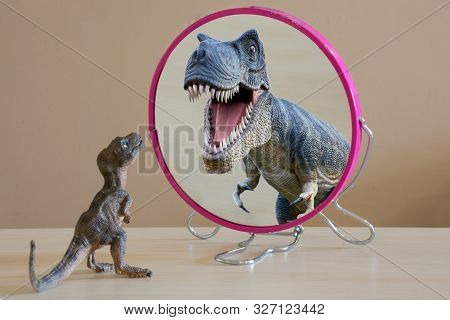 Little Dinosaur With Self Confidence See A Great Dinosaur Looking Itself Into The Mirror.little Dino