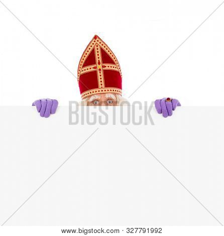 Sinterklaas or saint Nicholas holding blank cardboard. isolated on white background. Dutch character of Santa Claus