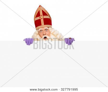 Sinterklaas or saint Nicholas holding blank cardboard. isolated on white background. Dutch character of Santa Claus