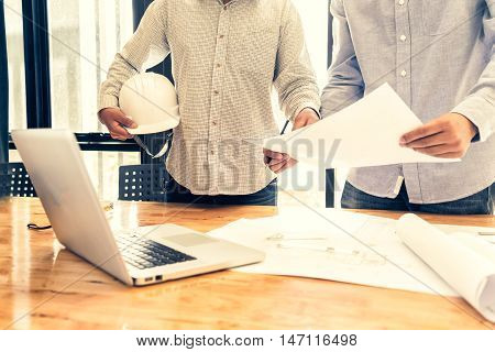 engineer people meeting working in office for discussing engineering concept architecture concept soft focus vintage tone