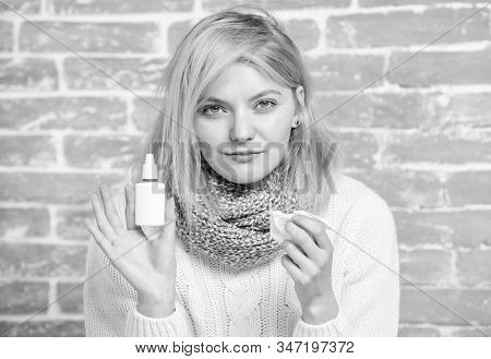 Girl Sick Person Hold Nasal Drops And Tissue. Allergy Concept. Home Treatment. Nasal Drops Plastic B