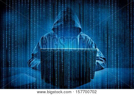 Hacker using laptop. Hacking the Internet.High resolution image.