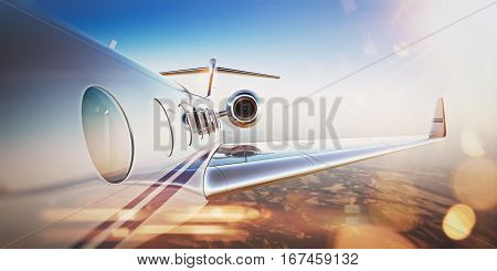 Business travel concept.Generic design of white luxury private jet flying in blue sky at sunset.Uninhabited desert mountains on the background.Horizontal, flares effect. 3D rendering.