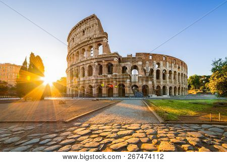 Colosseum At Sunrise, Rome, Italy, Europe. Rome Ancient Arena Of Gladiator Fights. Rome Colosseum Is