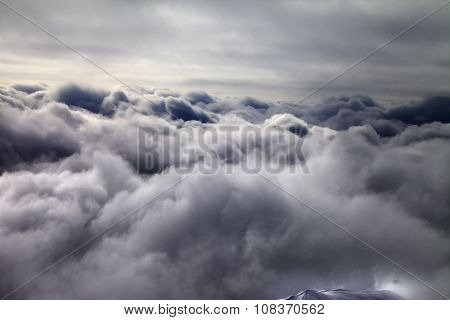 Top Of Off-piste Slope In Storm Clouds