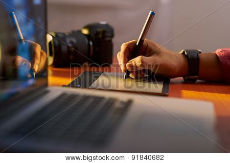 Artist Photographer Retouches Photo On Computer With Graphic Tablet