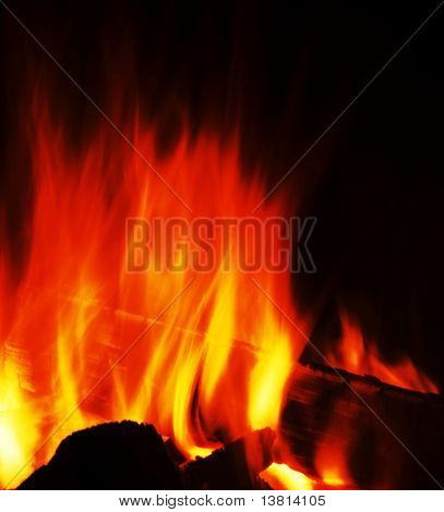 Camping fire on the black background