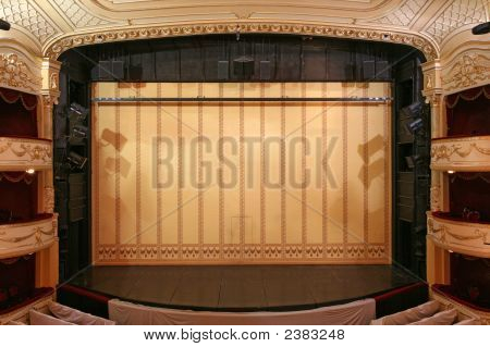 Theater Stage With Gold Safety Curtains