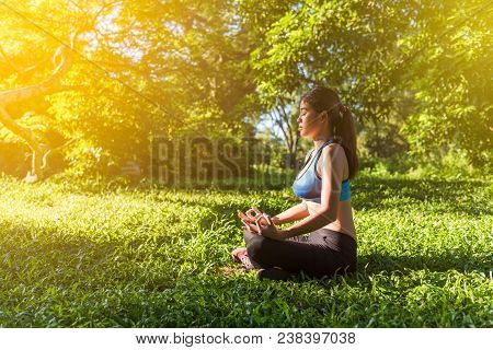 Yoga In The Park, Outdoor With Effect Light, Health Woman, Yoga Woman. Yoga Lifestyle Wellness Healt