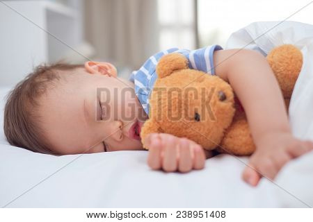 Cute Little Asian 18 Months / 1 Year Old Toddler Baby Boy Child Sleeping / Taking A Nap Under Blanke