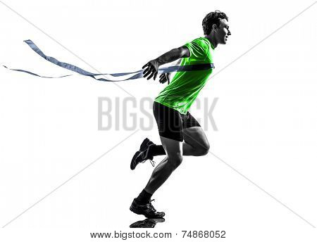 one  man young sprinter runner running winner at finish line in silhouette studio on white background