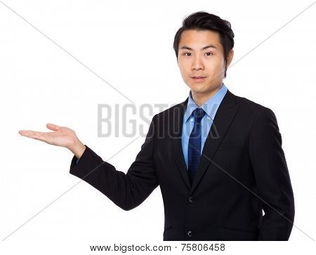 Businessman with open ahnd palm