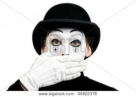 Close-up portrait of a male mime artist showing secret, silence. Isolated over white.