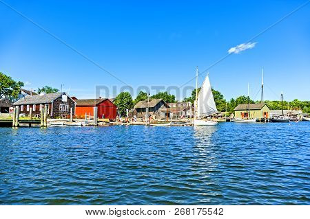 Mystic, Ct, Usa - July 6, 2014: People Enjoy A Sunny Day In The Mystic Seaport. Mystic Is One Of Con