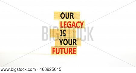 Legacy And Future Symbol. Concept Words Our Legacy Is Your Future On Wooden Blocks. Beautiful White 