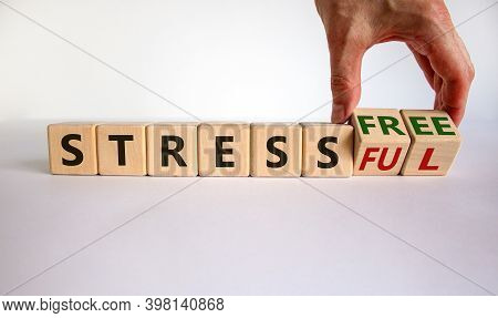 Stress-free Or Stressful Symbol. Hand Turns Cubes And Changes The Words 'stressful' To 'stress-free'