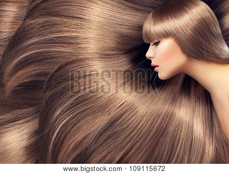 Beautiful Hair. Beauty woman with luxurious long hair as background. Beauty Model girl with Healthy blond Hair. Beautiful woman with long smooth shiny straight hair. Hairstyle. Hair cosmetics