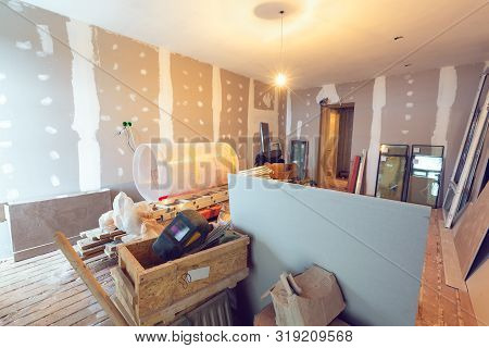 Working Process Of Renovate Room With Installing Drywall Or Gypsum Plasterboard And Construction Mat