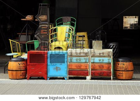 Vintage furniture and other staff at entry to shop at Jaffa flea market district in Tel Aviv-Jaffa, Israel.