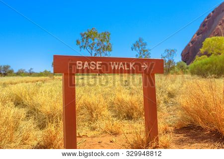 Uluru, Northern Territory, Australia - Aug 26, 2019: Uluru Base Walk Sign In Sand Path Of Uluru-kata