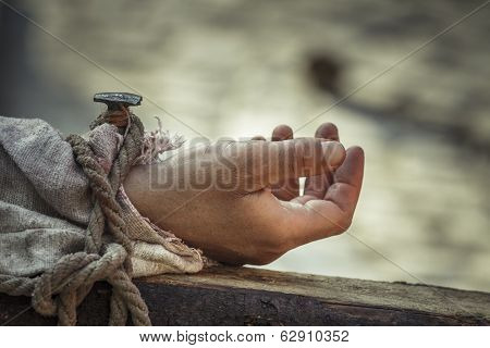 Nailed Hand On Wooden Cross