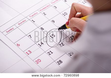 Close-up photo of calendar with a datum circled