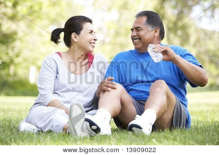 Senior Couple Resting After Exercise