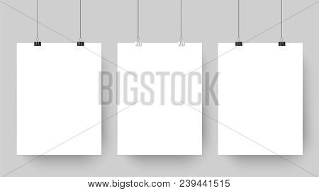 Empty Affiche Mockup Hanging On Paper Clips. White Blank Advertising Poster Template Casts Shadow On