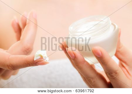 Skin Care. Moisturizing Cream In Female Hands