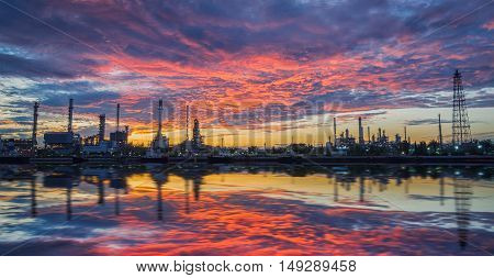 oil refinery industry plant along twilight morning. oil refinery industry reflection. oil refinery on beautiful sky. oil refinery produces gasoline. oil refinery in Bangkok Thailand.