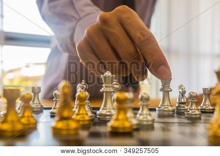 Business Man In Office And Chess Business Leader Success Idea. Working On Making Business Plan, Busi