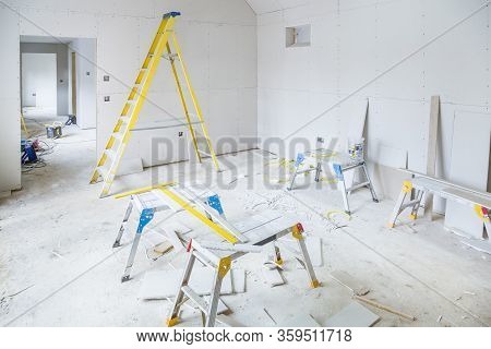 Gypsum Plasterboard Installation In A Room Interior During A House Renovation