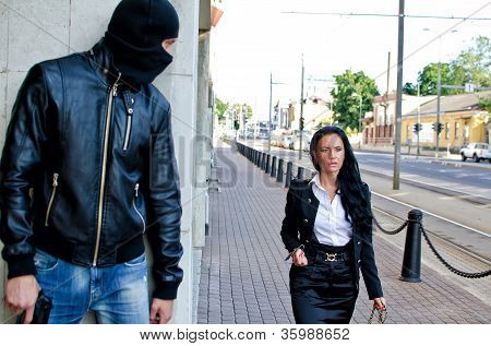 Bandit In Mask With Gun Waiting For Victim