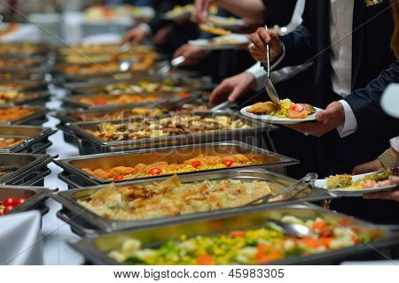 people group catering buffet food indoor in luxury restaurant with meat colorful fruits  and vegetables