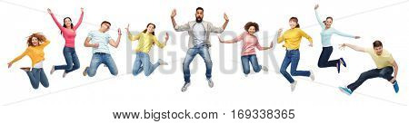 happiness, freedom, motion, diversity and people concept - international group of happy smiling men and women jumping over white background