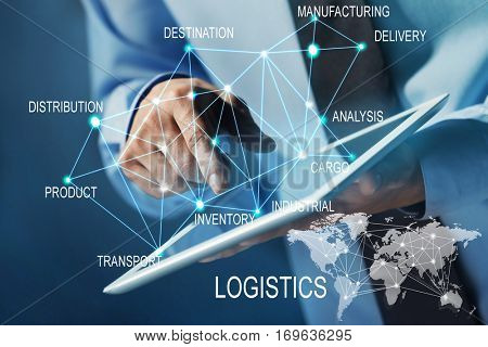 Logistics concept. Man with tablet and business strategy