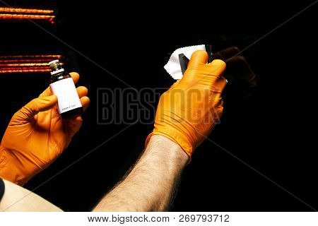 Car Polish Wax Worker Hands Polishing Car. Buffing And Polishing Vehicle With Ceramic. Car Detailing