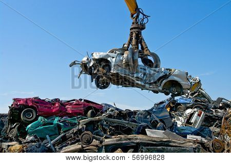 Junkyard Picking Up Car