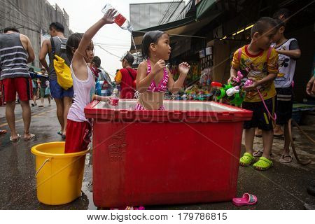 Bangkok, Thailand - April 13, 2014 : The Songkran festival or Thai New Year's festival in JJ market in Bangkok, Thailand.