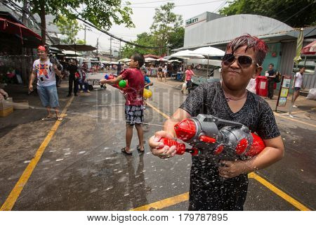 Bangkok, Thailand - April 13, 2014 : The Songkran festival or Thai New Year's festival in JJ market in Bangkok, Thailand.