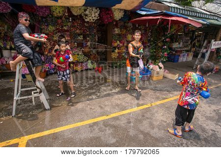 Bangkok, Thailand - April 13, 2014 : The Songkran festival or Thai New Year's festival in JJ market in Bangkok, Thailand.