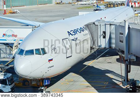 Moscow, Russia - September 16, 2020: Boarding Passengers On A Plane Using A Jet Bridge And Loading B