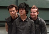 Michael Ryan Photo - New York NY 5-16-09 EXCLUSIVEThree time Grammy Award winning group Green Day (Billy Joe Armstrong (c) Tres Cool (Frank Edwin Wright III) (r) and Michael Ryan Pritchard (Dirnt) (l) jump out of a van for a quick private photo shoot wih their own photographer outside the Prada store in SoHoEXCLUSIVE Digital photo by Jamie Scull-PHOTOlinknet