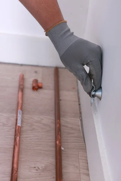 Plumber fitting copper pipes - Stock Image - Everypixel