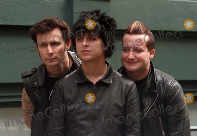 Michael Ryan Photo - New York NY 5-16-09 EXCLUSIVEThree time Grammy Award winning group Green Day (Billy Joe Armstrong (c) Tres Cool (Frank Edwin Wright III) (r) and Michael Ryan Pritchard (Dirnt) (l) jump out of a van for a quick private photo shoot wih their own photographer outside the Prada store in SoHoEXCLUSIVE Digital photo by Jamie Scull-PHOTOlinknet