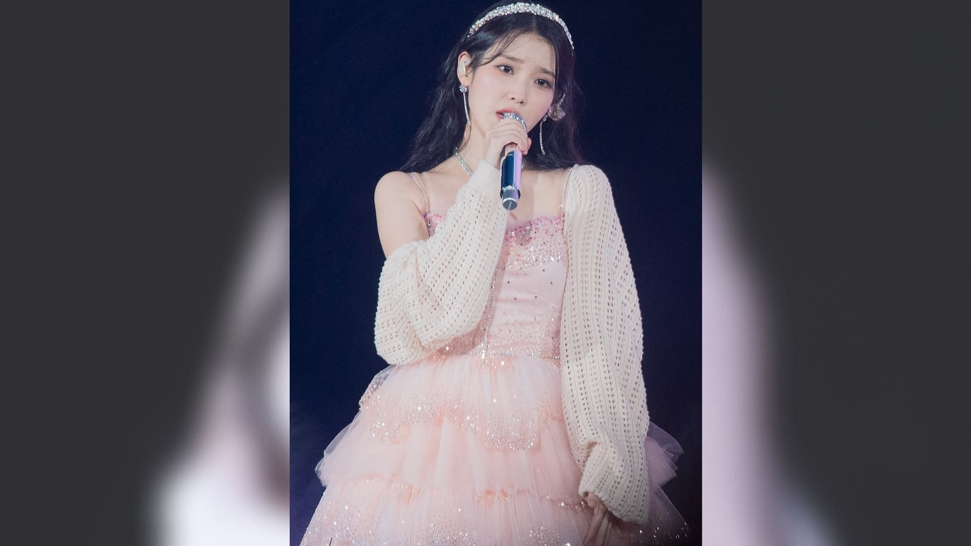 Jieun paired this look with a diamond encrusted head band and a cream knitted cardigan (Image via Twitter/IU_Louis)