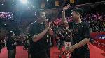 Indonesian men's doubles badminton players Mohammad Ahsan and Hendra Setiawan (left) greet their fans during the Moment of Honor, Tribute to The Daddies event at Istora Senayan, Jakarta, January 26, 2025. Antara/Fauzan